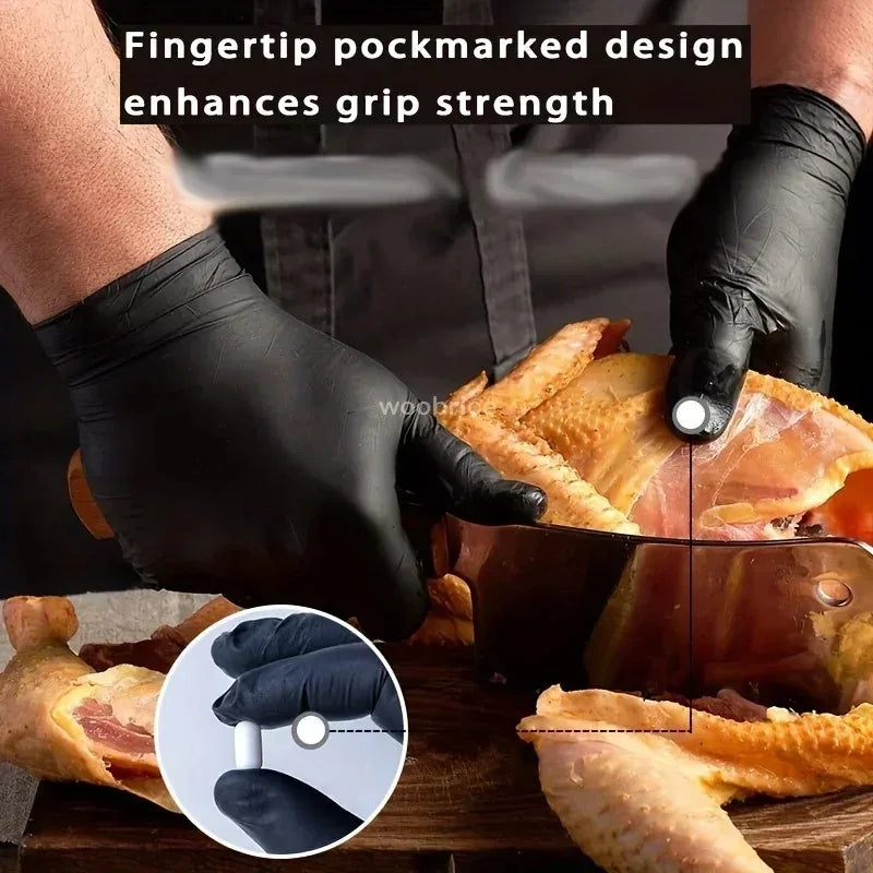 A hand wearing a black nitrile glove is holding a finger-tip marked design on a food item.