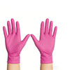 Par de guantes desechables de nitrilo rosa mostrados contra un fondo blanco.
