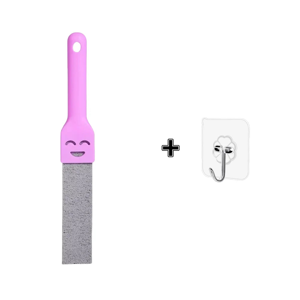A pink pumice cleaning scrubber stick with a handle and abrasive surface, next to a metal cleaning tool.