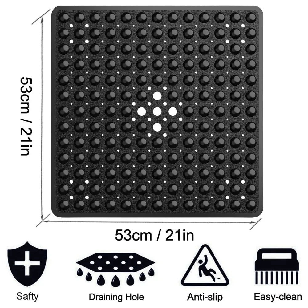 Black non-slip shower mat with numerous suction cups and a drainage hole