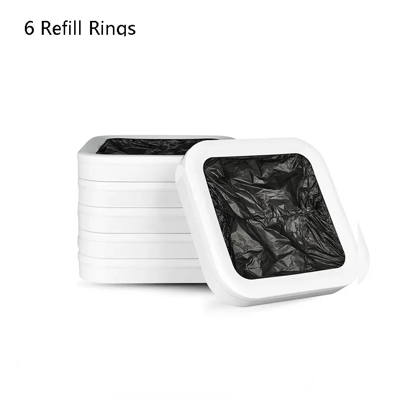 A stack of six white refill rings for kitchen trash cans.
