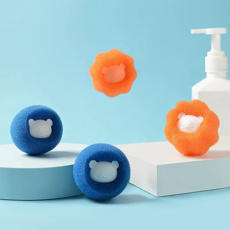 Orange and blue reusable pet hair remover balls displayed on a white surface with a white pump bottle in the background.