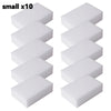 Ten small white melamine cleaning sponges or magic erasers arranged in two vertical stacks.