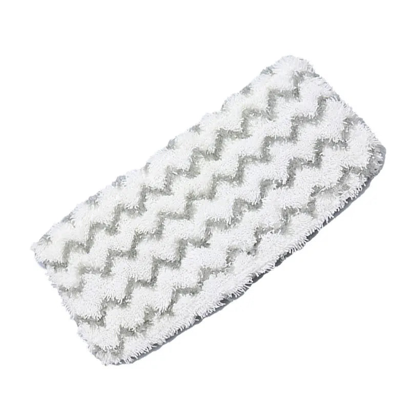 Replacement microfiber pads for a Shark steam mop with a white and gray chevron pattern