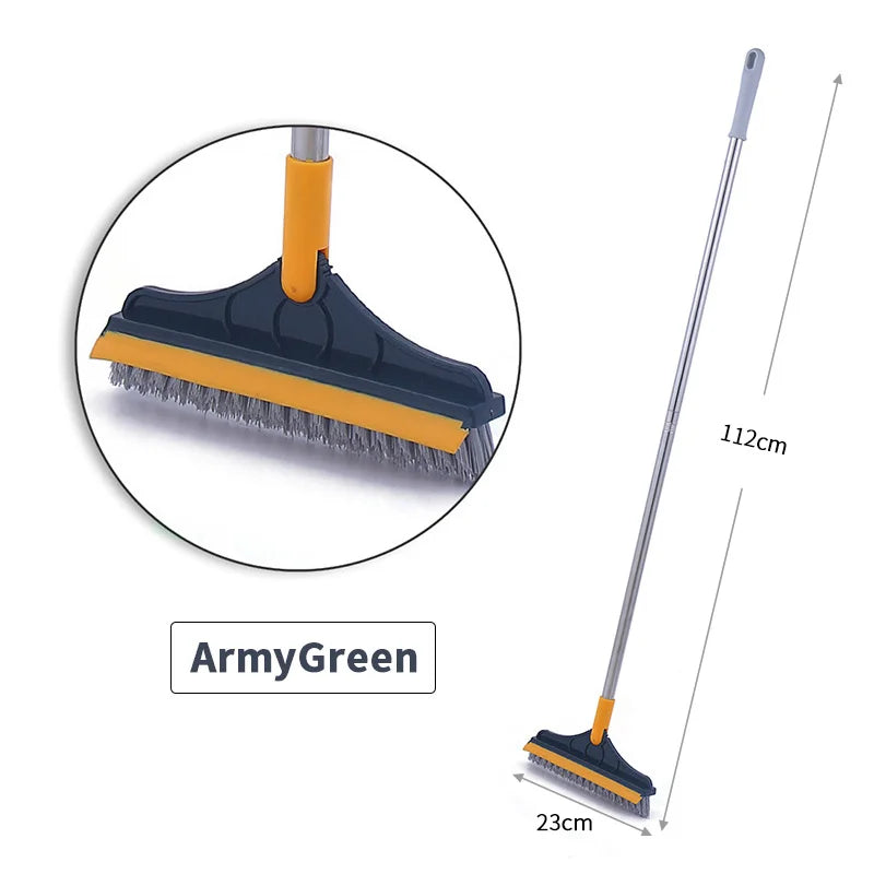 A long gray floor scrubbing brush with an orange handle and a wide cleaning head, shown next to its disassembled parts.