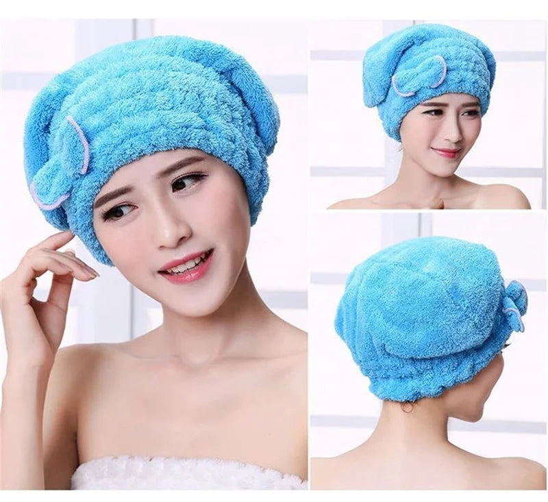 A woman wearing a bright blue microfiber hair drying towel cap, shown in close-up and full view.