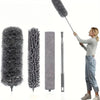 A woman is holding a retractable microfiber dust duster, showing various sizes of the cleaning tool.