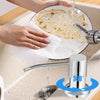 A hand is using an under-sink kitchen soap dispenser to pour water into a plate of food.