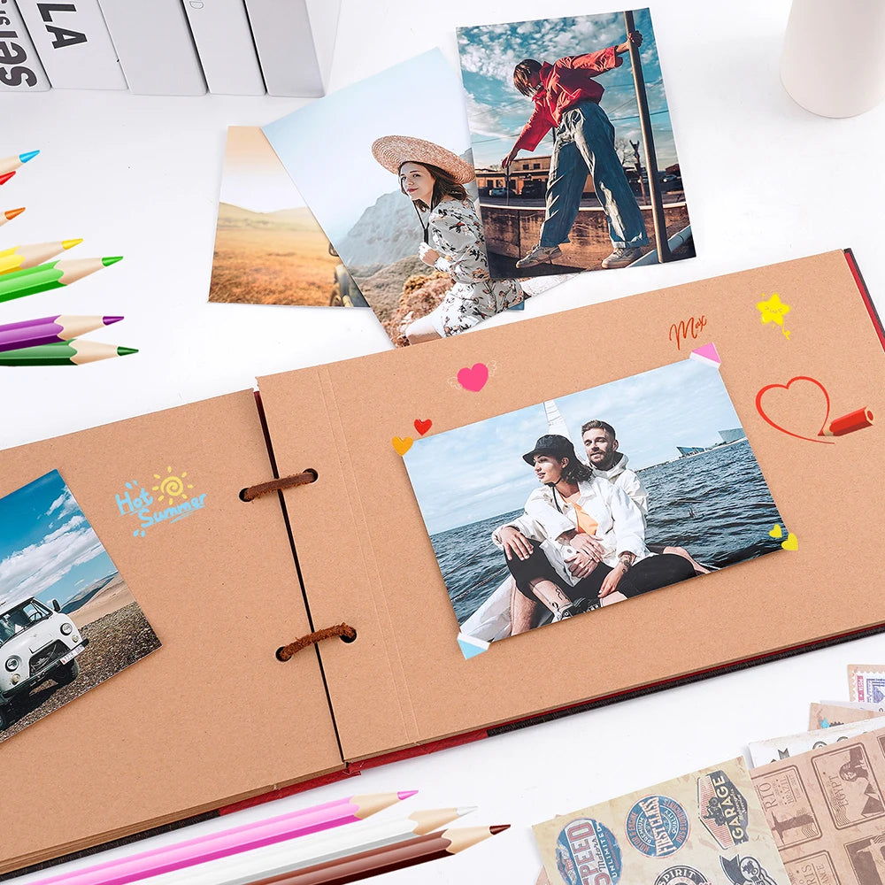 A handmade kraft scrapbook photo album filled with colorful photos and sketches.