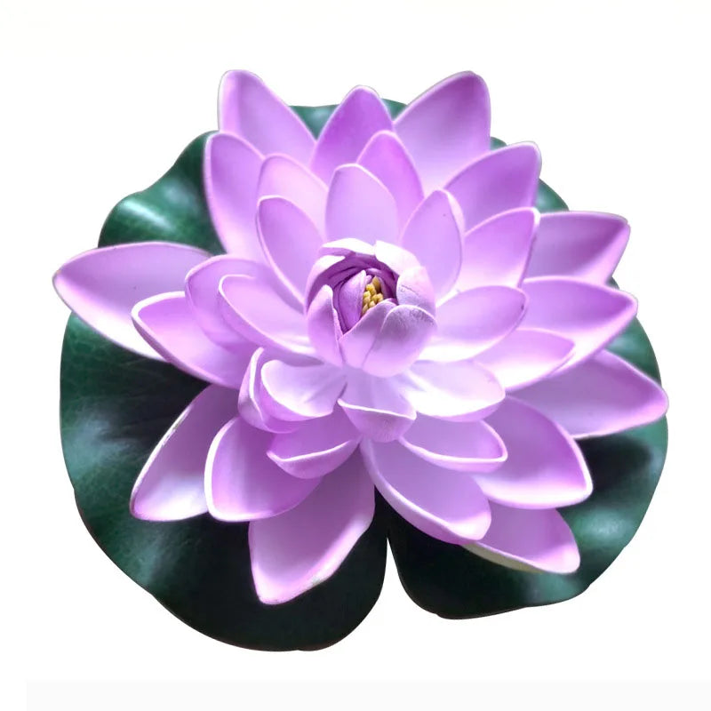 A vibrant purple artificial lotus flower with green leaves used for pond and garden decor.