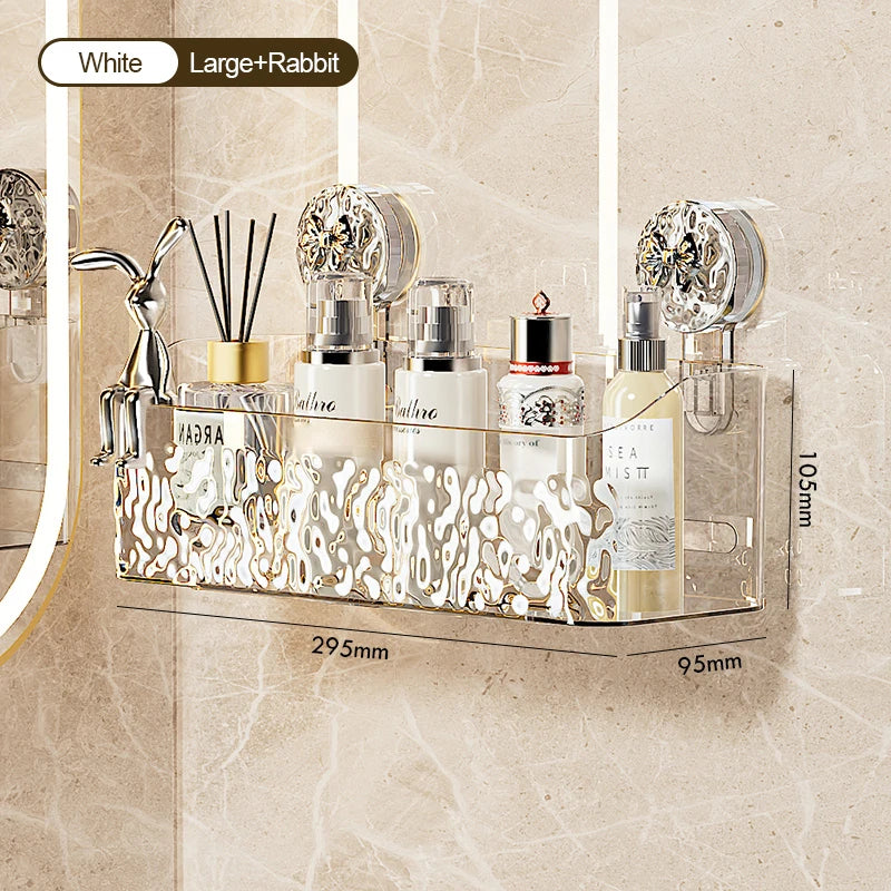 A clear stainless steel suction cup storage rack holding various beauty products like perfume bottles and brushes.
