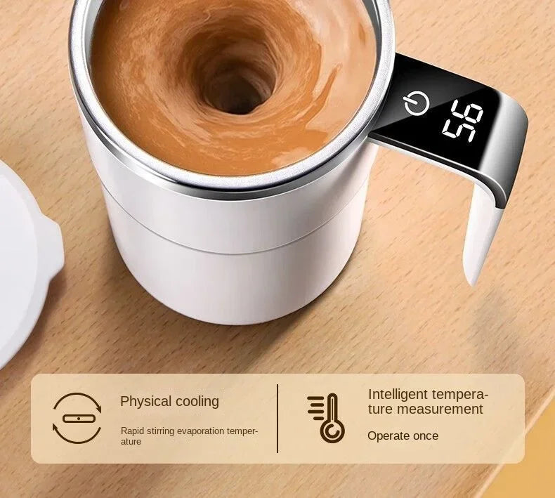 A close-up of an electric self-stirring coffee mug with a stainless steel lid and a digital temperature display showing 56 de