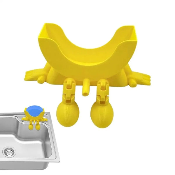 A yellow multi-use sponge holder designed to fit into kitchen drainage.