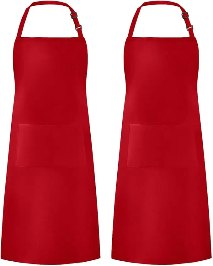 A solid red chef apron with two pockets and adjustable straps.
