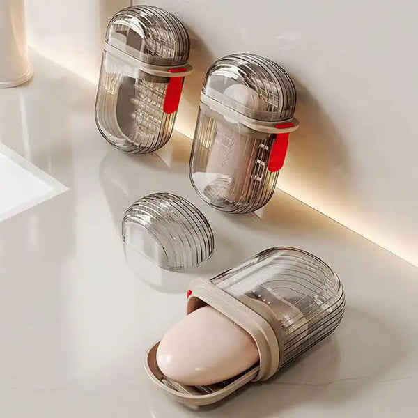 Three clear plastic containers with red lids are displayed on a white surface, one holding an egg.