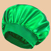A vibrant green satin wide brim shower cap shown from above.