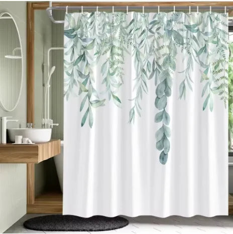 A white shower curtain featuring a tropical garden design of green leaves and butterfly motifs.