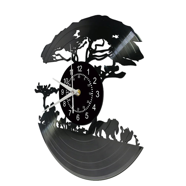 A black vintage vinyl record wall clock featuring a silhouette of a tree and animals on the face.