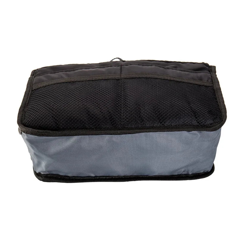 A black foldable cosmetic organizer pouch with a translucent gray bottom section.
