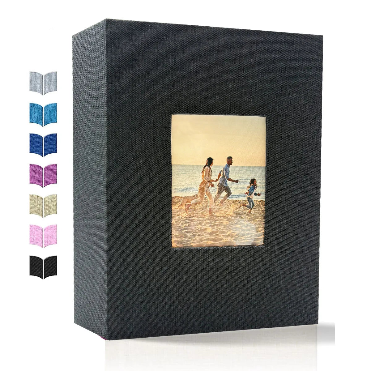 A black linen photo album with a square opening displaying a horizontal photograph of two people walking on a beach.