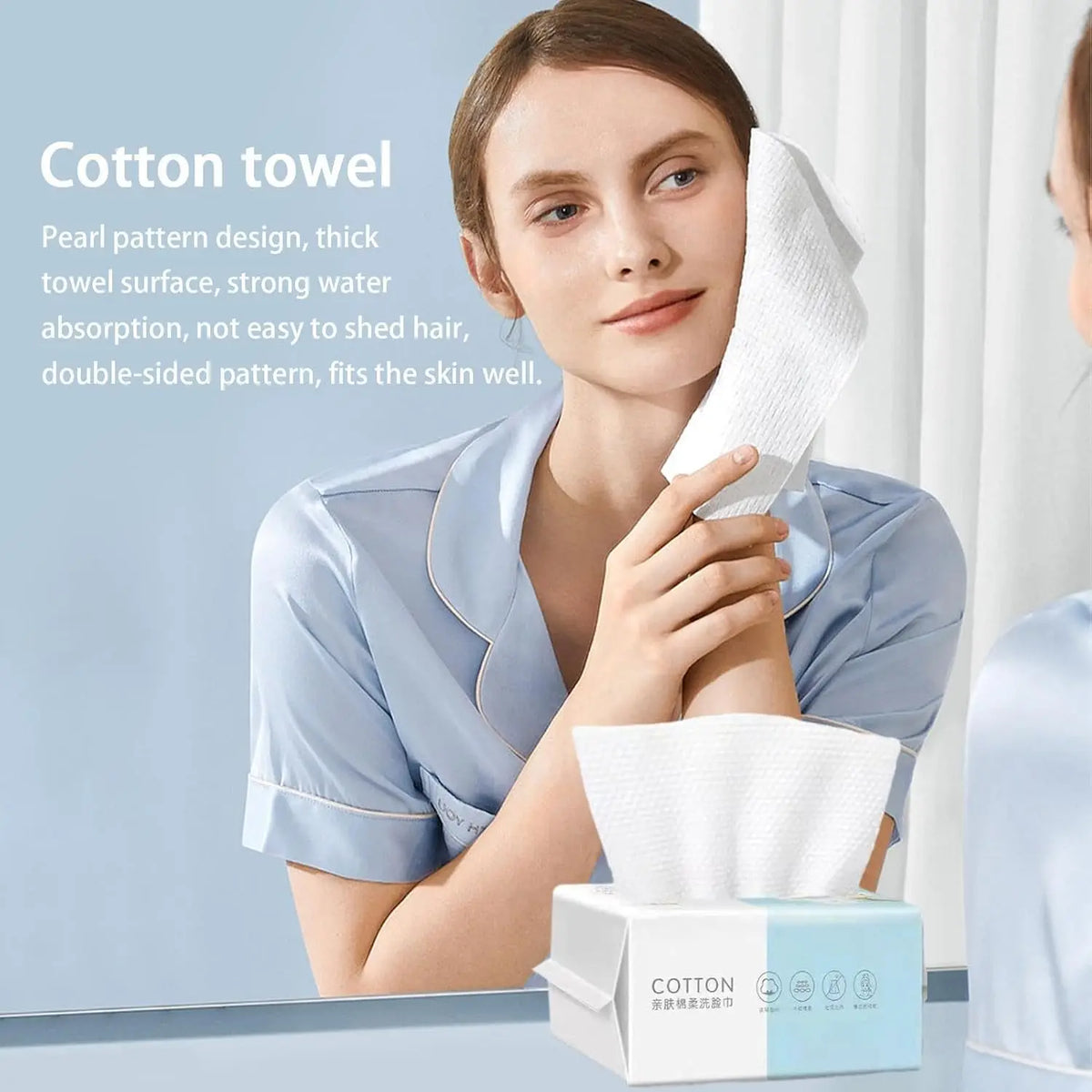 A woman is holding a white cotton facial wipe product box and a single wipe, demonstrating the features of the towel.