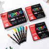 A set of Yihui acrylic brush markers in various colors and tips displayed on a white surface.