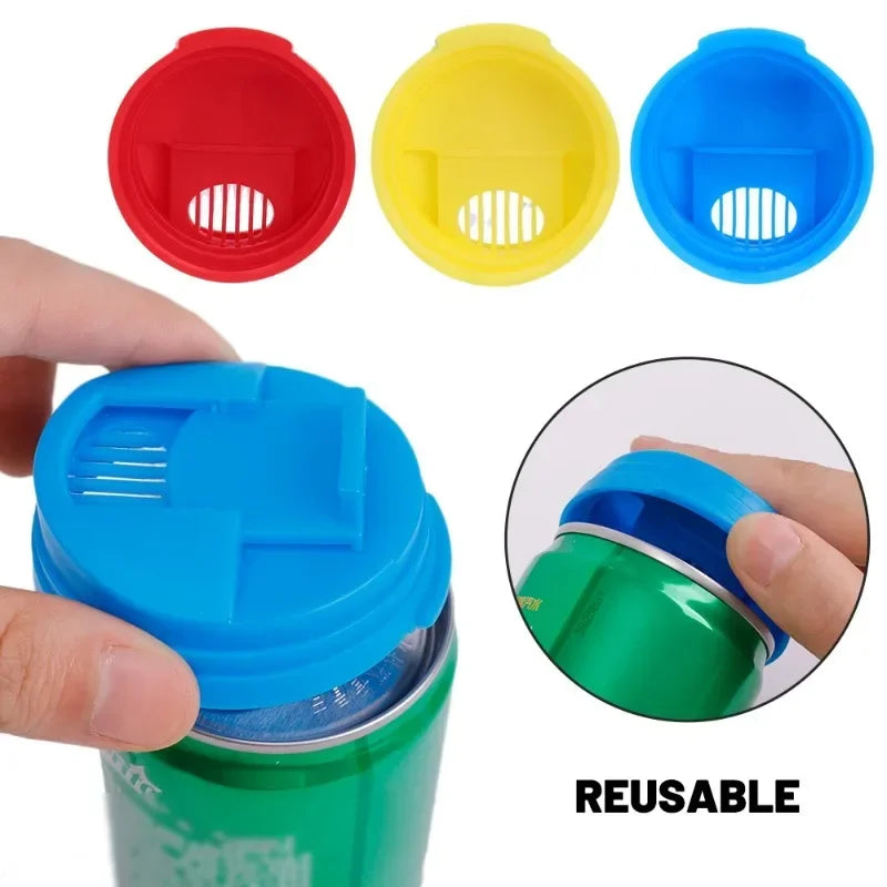 A set of reusable plastic beverage can seals in red, yellow, and blue colors shown alongside a green can.