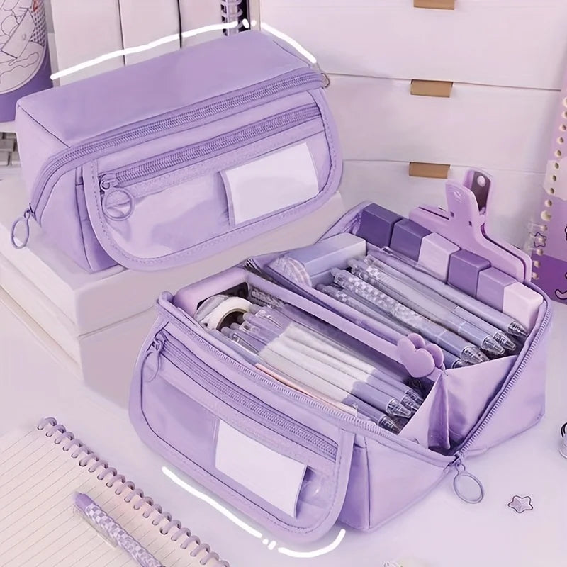 A purple multi-compartment pencil case organizer with zippered sections is shown on a white desk surface.