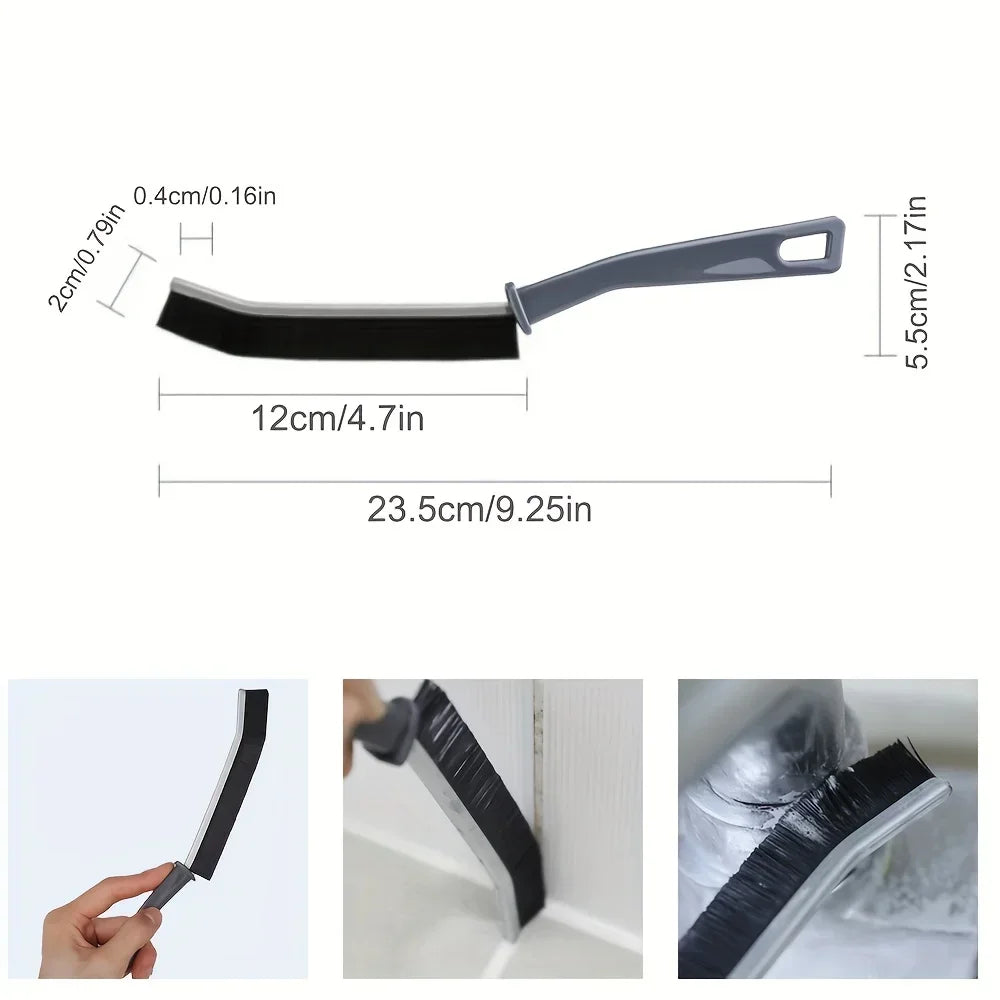 A black hard bristle crevice cleaning brush with a gray non-slip handle shown in various angles.