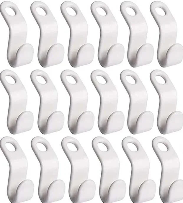 A set of white multi-function plastic clothes hanger connector hooks.