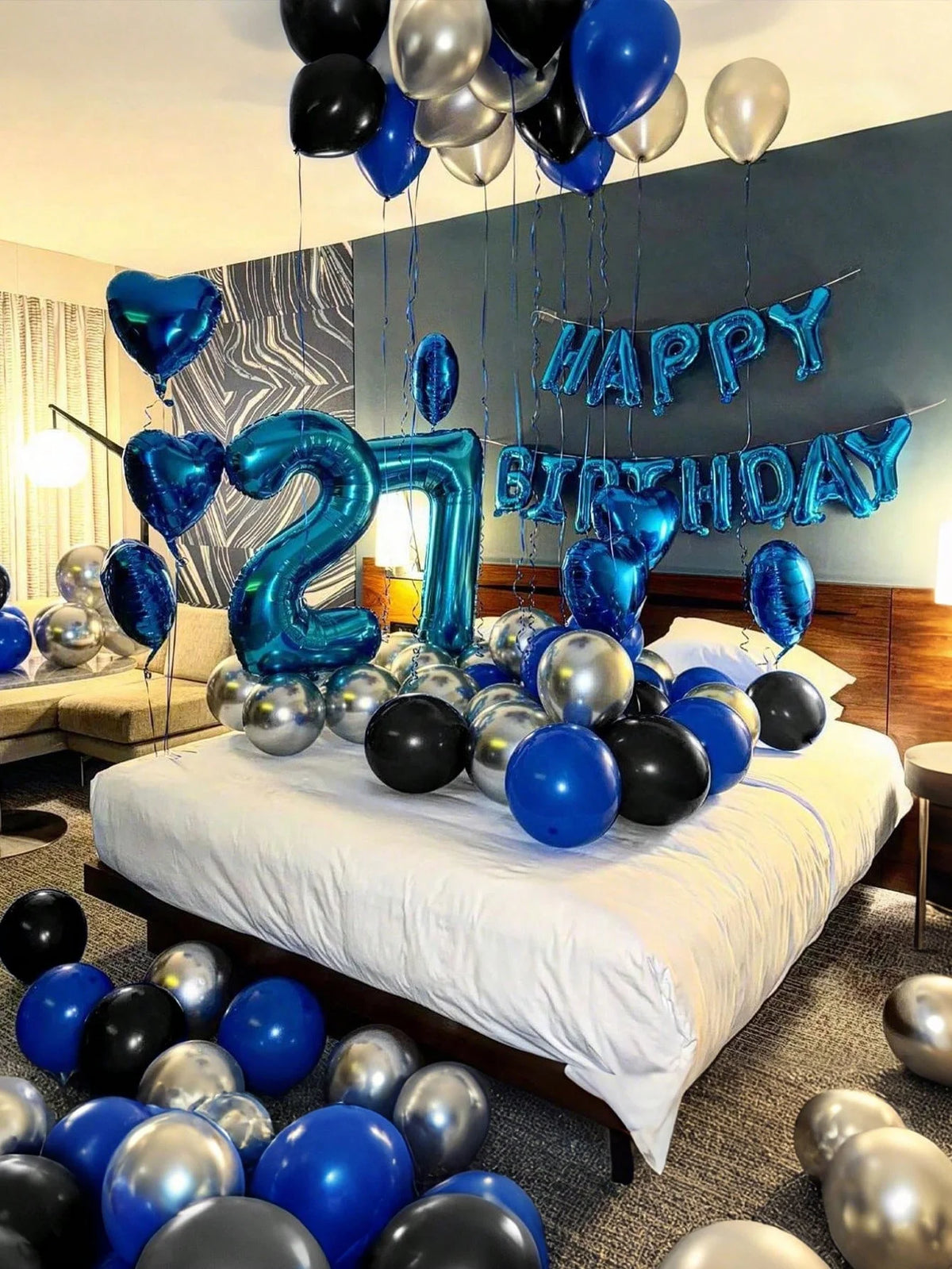 Blue heart birthday party decoration set featuring blue and silver balloons and a large number 27
