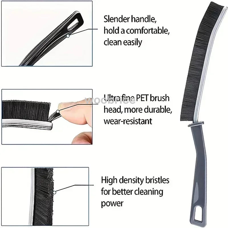 A close-up view of a black crevice cleaning brush showing its slender handle, ultra-fine PET brush head, and high density bri