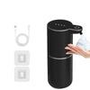 Dispensador automático recargable de jabón negro con bomba y botella blanca.