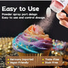 A close-up of a colorful frosted cupcake being decorated with edible gold and glitter powder.