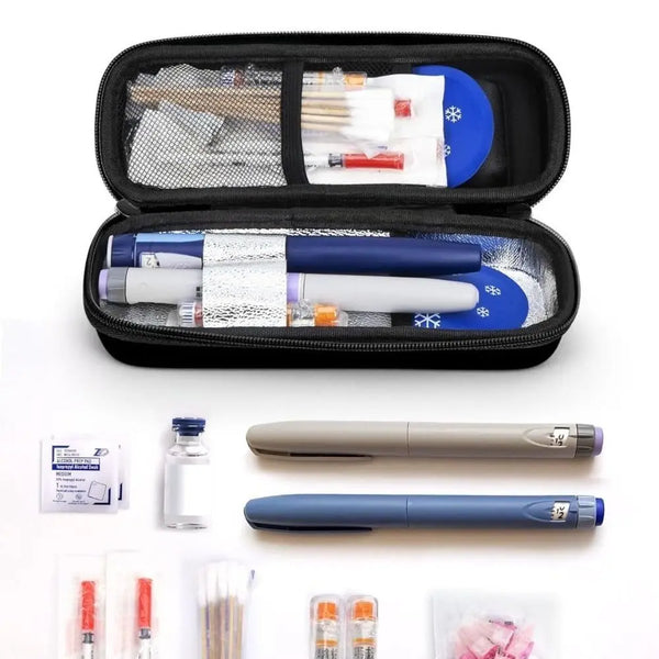 Insulin cooler travel case showing various insulin pens and supplies inside.