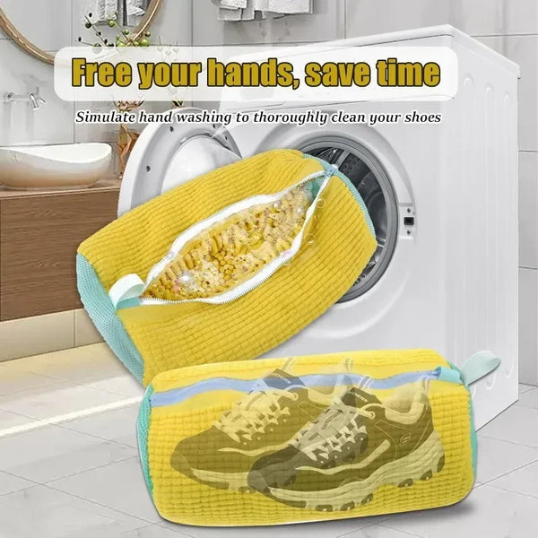 Yellow laundry bag with a zipper simulating hand washing used to clean shoes inside a white washing machine drum.