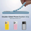 A hand is gripping a blue silicone suction cup phone grip, demonstrating the double-sided phone suction grip for hands-free u
