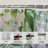 A set of 12 hooks and a shower curtain with a tropical leaf pattern are shown for installation.