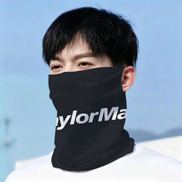 A person wearing a black multifunctional windproof neck gaiter covering their lower face against a light blue background.