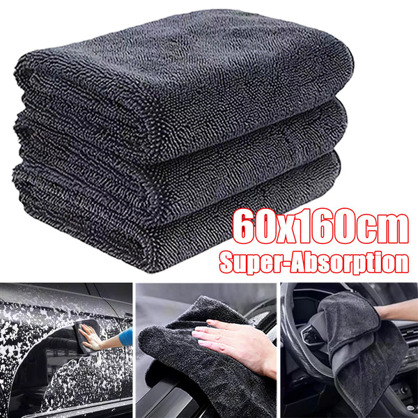 Stack of dark gray microfiber car cleaning and drying towels demonstrating super-absorption.