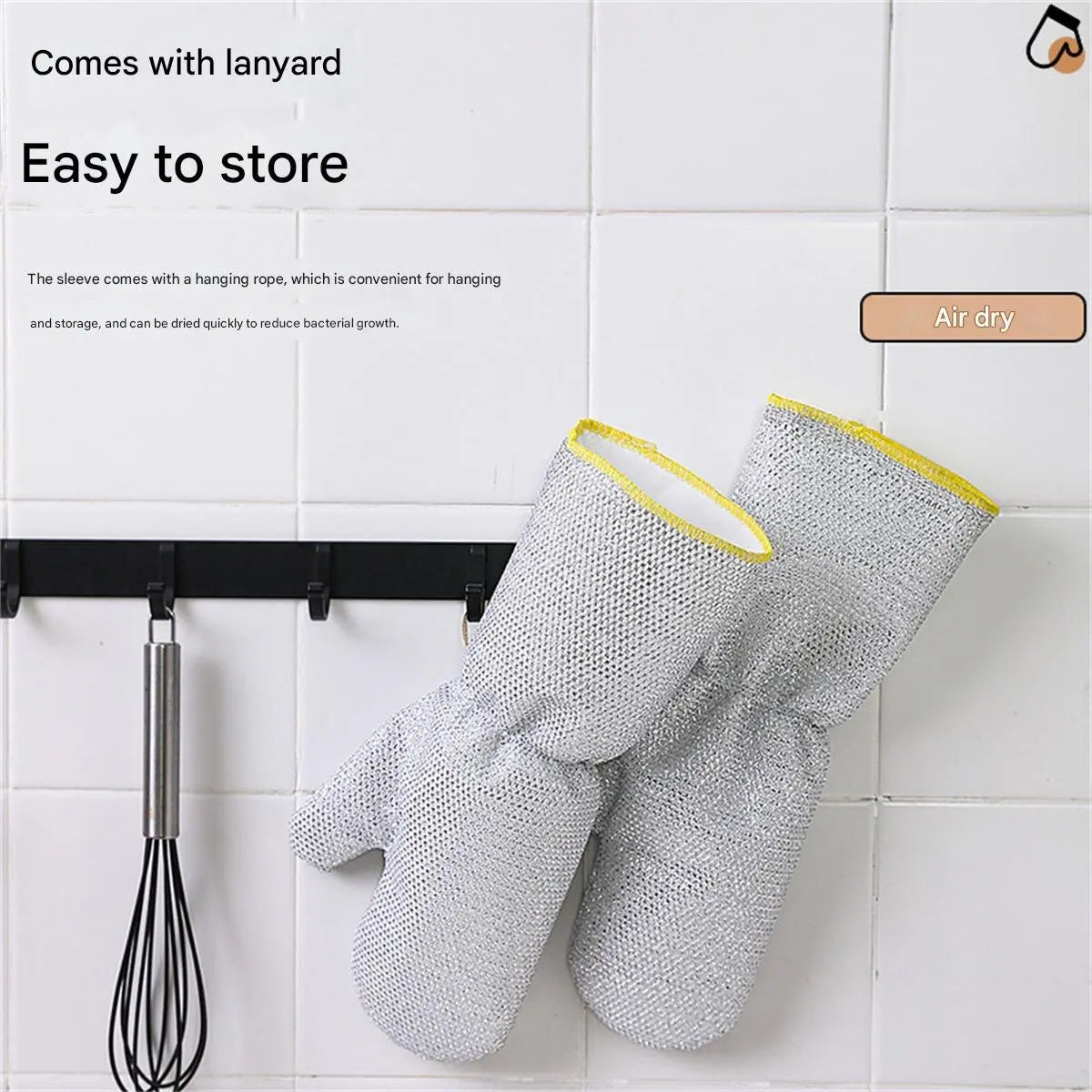 Pair of silver steel wire dishwashing gloves hanging on a rack.