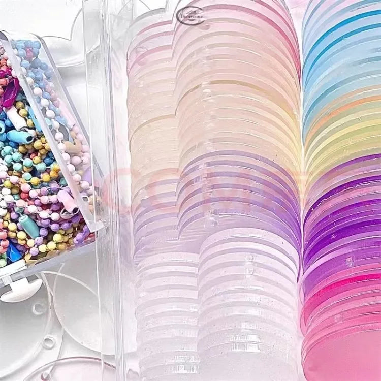 A collection of iridescent, rainbow-colored vinyl stickers in a clear plastic container and a fan display.