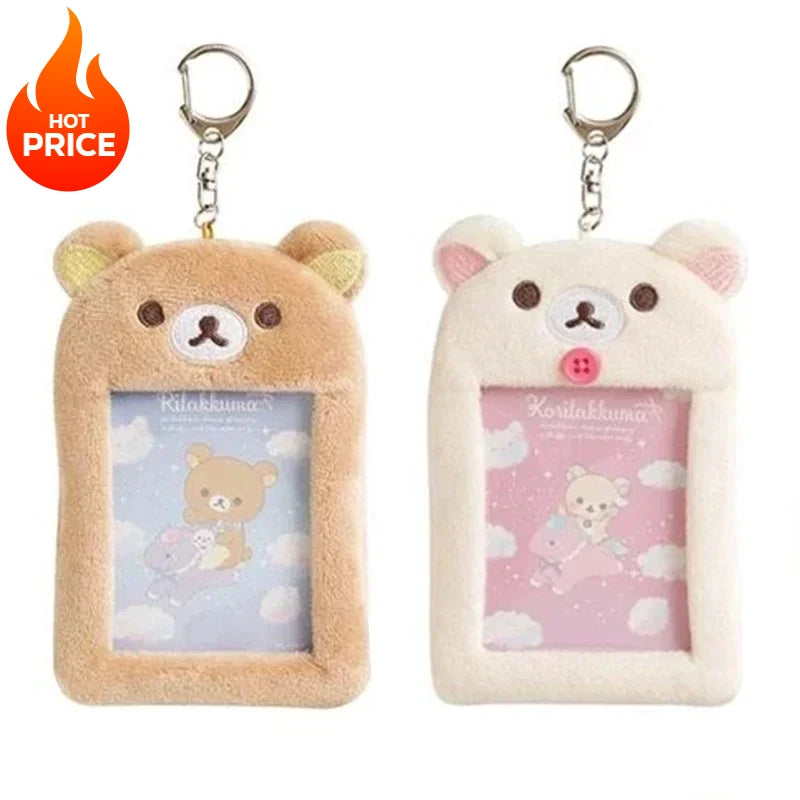 A pair of Rilakkuma plush ID card holders with a keychain attached, featuring light brown and pink colors.