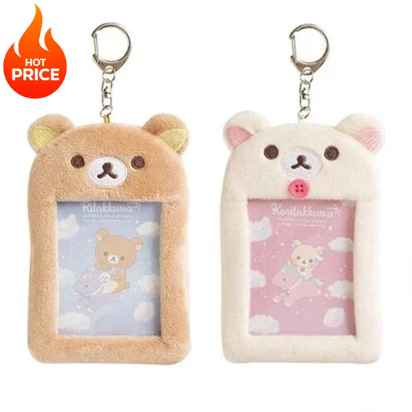 A pair of Rilakkuma plush ID card holders with a keychain attached, featuring light brown and pink colors.