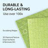 Close-up of green reusable microfiber dishcloths showing textured ridges and diamond surface for cleaning.