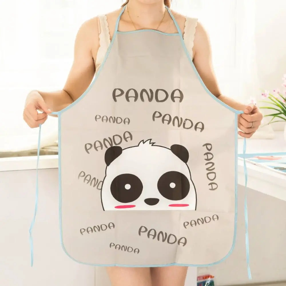 A person wearing a gray oil-proof cooking apron with a panda print and light blue ties.