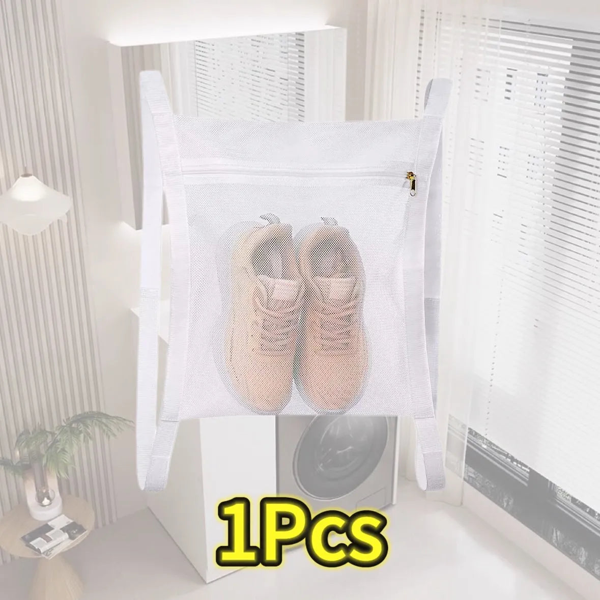 A pair of light beige reusable mesh laundry bags for shoes displayed against a white background.