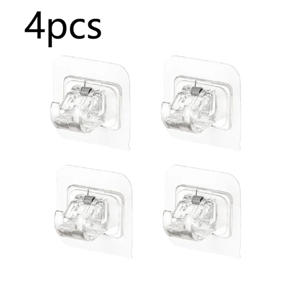 A set of four clear self-adhesive curtain rod hooks packaged in individual plastic holders.