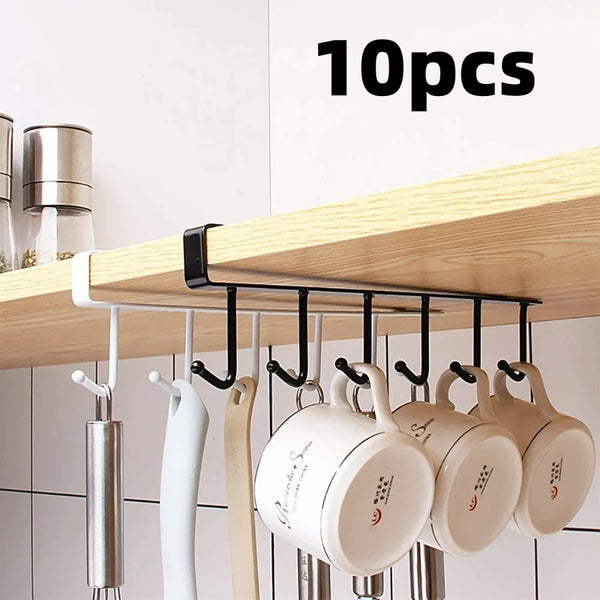 A wooden shelf holds a black metal storage rack with ten white ceramic containers for kitchen or wardrobe use.