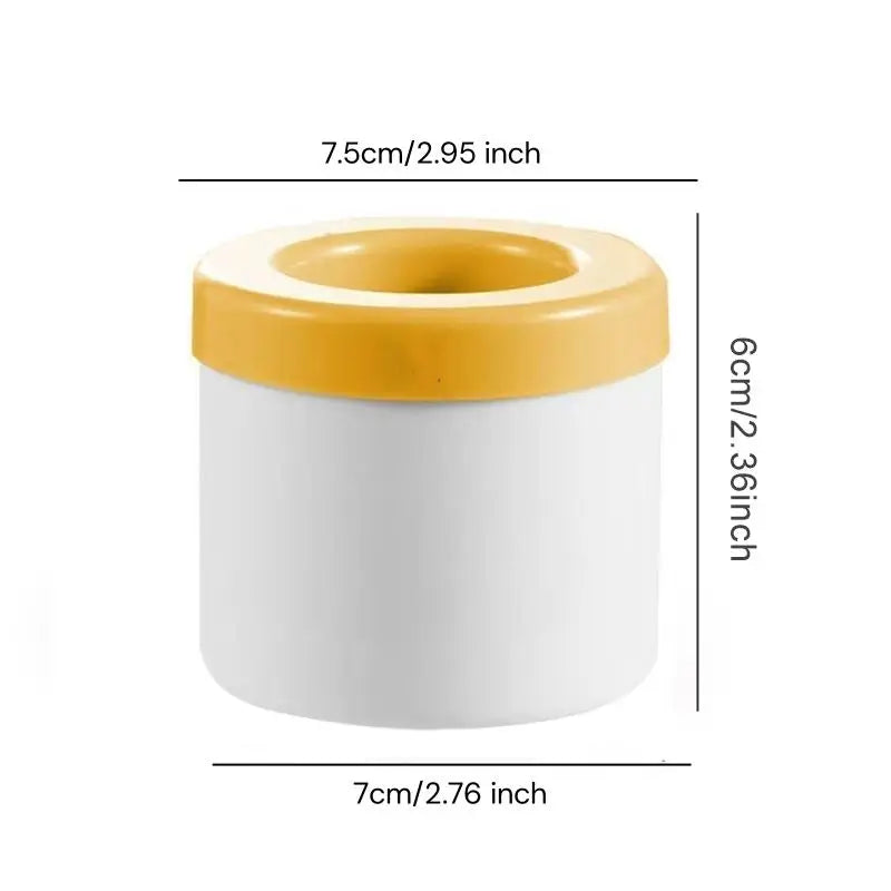 A white silicone ice cube mold with a yellow rim, shown in a side view.